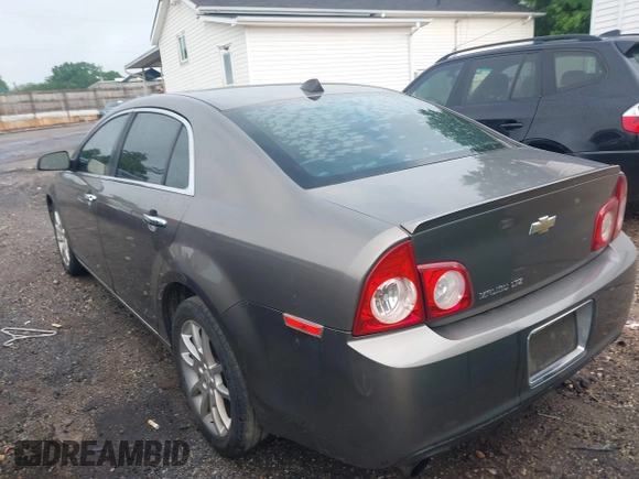 2012 Chevrolet Malibu LTZ with VIN 1G1ZG5E7XCF200982, listed as a IAAI auction lot 42052609 with 196,449 mi miles and . Bid and sale history available at DreamBid. Image 3.