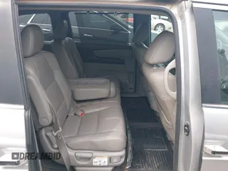 2012 Honda Odyssey EX-L with VIN 5FNRL5H66CB081323, listed as a IAAI auction lot 42465110 with 266,934 mi miles and . Bid and sale history available at DreamBid. Image 8.