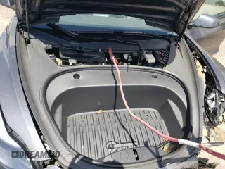 2023 Tesla Model 3 z VIN 5YJ3E1EA3PF546695, wystawiony jako Copart lot #57075155 z przebiegiem 35 871 mil mil oraz Szkoda całkowita • Salvage title. Historia ofert i sprzedaży dostępna na DreamBid. Obrazek 11.