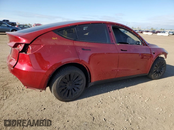 2024 Tesla Model Y Long Range with VIN 7SAYGDEE4RA257722, listed as a Copart auction lot 54577865 with 10,713 mi miles and Salvage Title. Bid and sale history available at DreamBid. Image 3.