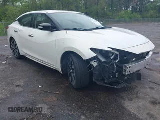 2016 Nissan Maxima SV z VIN 1N4AA6AP2GC401273, wystawiony jako IAAI lot #41898456 z przebiegiem 139 720 mil mil oraz . Historia ofert i sprzedaży dostępna na DreamBid. Obrazek 1.