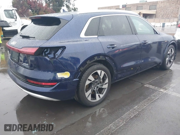 2022 Audi e-tron Premium Plus with VIN WA1LAAGE5NB022695, listed as a IAAI auction lot 41181338 with 14,711 mi miles and . Bid and sale history available at DreamBid. Image 4.