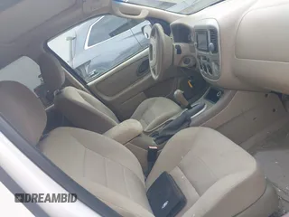 2006 Ford Escape XLT with VIN 1FMCU93186KD02820, listed as a IAAI auction lot 42434306 with 204,152 mi miles and . Bid and sale history available at DreamBid. Image 5.
