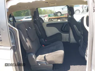 2016 Dodge Grand Caravan SXT with VIN 2C4RDGCG7GR325113, listed as a IAAI auction lot 42045811 with 86,372 mi miles and . Bid and sale history available at DreamBid. Image 8.