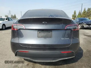 2024 Tesla Model Y Long Range with VIN 7SAYGDEE1RA266653, listed as a Copart auction lot 62277865 with 8,189 mi miles and Salvage title. Bid and sale history available at DreamBid. Image 6.