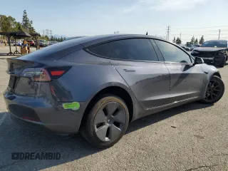 2023 Tesla Model 3 с VIN 5YJ3E1EA9PF412192, выставлен на аукционе Copart как лот 52122045 с пробегом 72 230 миль миль и Списание • Salvage title. История ставок и продаж доступна на DreamBid. Изображение 3.