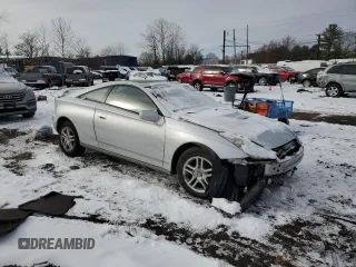 2000 Toyota Celica GT with VIN JTDDR32TXY0020977, listed as a Copart auction lot 86059314 with 249,829 mi miles and Salvage Title. Bid and sale history available at carsss.com. Image 4.