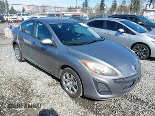 2011 Mazda Mazda3 i Sport with VIN JM1BL1UG4B1480828, listed as a IAAI auction lot 41868170 with 136,876 mi miles. Bid and sale history available at carsss.com. Image 1.