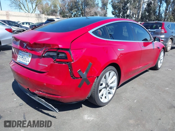 2018 Tesla Model 3 Long Range Battery with VIN 5YJ3E1EB5JF146184, listed as a IAAI auction lot 41808346 with 97,496 mi miles and . Bid and sale history available at DreamBid. Image 4.