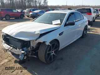 2015 BMW M5 z VIN WBSFV9C53FD594181, wystawiony jako IAAI lot #41761355 z przebiegiem Nie podano mil oraz . Historia ofert i sprzedaży dostępna na DreamBid. Obrazek 2.