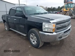 2013 Chevrolet Silverado 1500 LS with VIN 3GCPKREA2DG301949, listed as a IAAI auction lot 41532183 with 200,627 mi miles and . Bid and sale history available at DreamBid. Image 1.