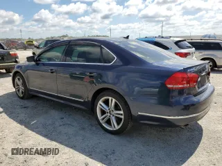 2014 Volkswagen Passat SEL Premium with VIN 1VWCN7A32EC018096, listed as a Copart auction lot 56972805 with 118,515 mi miles and Non repairable. Bid and sale history available at DreamBid. Image 2.