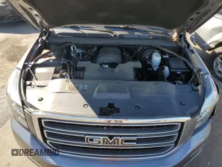 2019 GMC Yukon SLE with VIN 1GKS2AKC4KR334387, listed as a Copart auction lot 77267774 with 62,821 mi miles and Salvage Title. Bid and sale history available at carsss.com. Image 12.