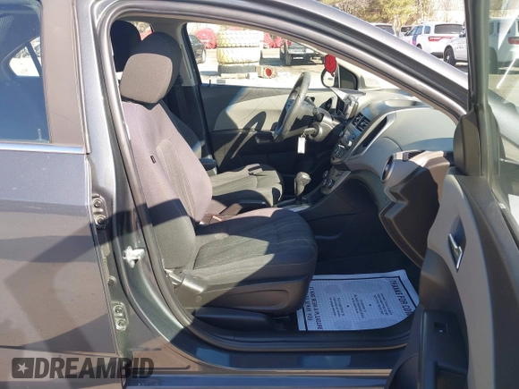 2013 Chevrolet Sonic LT with VIN 1G1JC5SG5D4135971, listed as a IAAI auction lot 41762168 with 140,493 mi miles and . Bid and sale history available at DreamBid. Image 5.