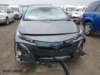 2021 Toyota Prius Prime LE with VIN JTDKAMFP3M3188311, listed as a IAAI auction lot 41668815 with 41,167 mi miles. Bid and sale history available at carsss.com. Image 6.