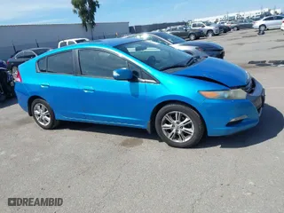2010 Honda Insight EX with VIN JHMZE2H71AS036502, listed as a IAAI auction lot 41902788 with 169,737 mi miles. Bid and sale history available at carsss.com. Image 13.