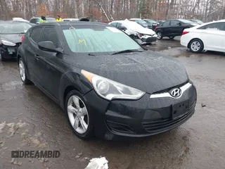 2012 Hyundai Veloster w/Black Int with VIN KMHTC6ADXCU024923, listed as a IAAI auction lot 41556793 with 101,923 mi miles and . Bid and sale history available at DreamBid. Image 1.