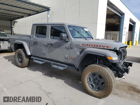2023 Jeep Gladiator Mojave z VIN 1C6JJTEG7PL548084, wystawiony jako Copart lot #52827265 z przebiegiem 26 789 mil mil oraz Czysty tytuł • Clean title. Historia ofert i sprzedaży dostępna na DreamBid. Obrazek 4.