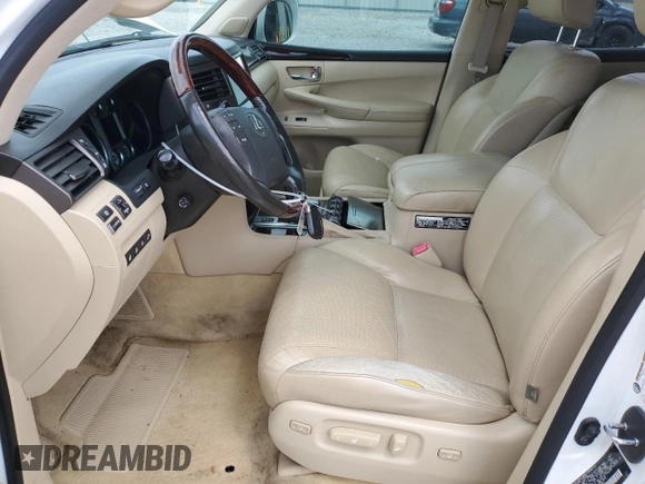 2011 Lexus LX 570 z VIN JTJHY7AXXB4061977, wystawiony jako Copart lot #57298345 z przebiegiem 177 793 mil mil oraz Szkoda całkowita • Salvage title. Historia ofert i sprzedaży dostępna na DreamBid. Obrazek 7.