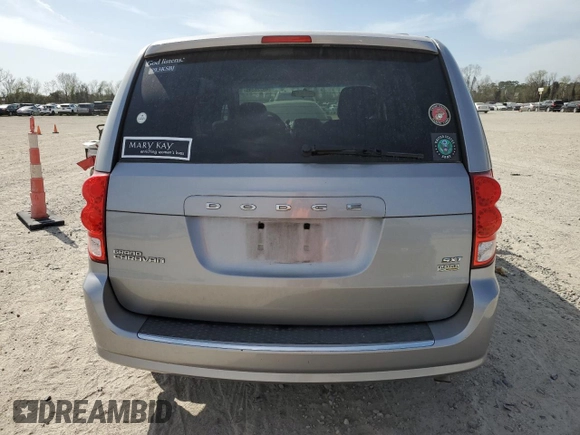 2014 Dodge Grand Caravan SXT with VIN 2C4RDGCG2ER273533, listed as a Copart auction lot 49228495 with 124,070 mi miles and Salvage Title. Bid and sale history available at DreamBid. Image 6.
