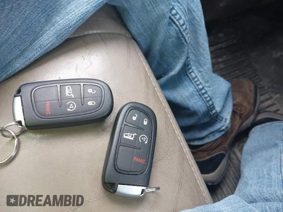 2021 Jeep Cherokee Latitude Lux z VIN 1C4PJMMX4MD221786, wystawiony jako IAAI lot #42432825 z przebiegiem 54 297 mil mil oraz . Historia ofert i sprzedaży dostępna na DreamBid. Obrazek 11.