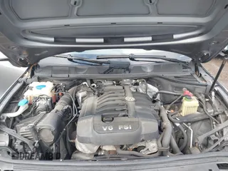 2013 Volkswagen Touareg Lux with VIN WVGEF9BPXDD000679, listed as a IAAI auction lot 41956471 with 117,465 mi miles and . Bid and sale history available at DreamBid. Image 10.