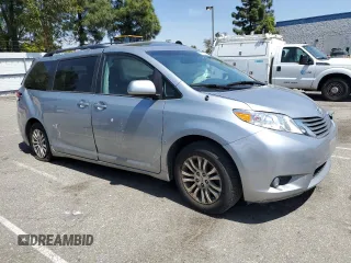 2014 Toyota Sienna XLE with VIN 5TDYK3DC7ES523796, listed as a Copart auction lot 52195795 with 0 mi miles and Salvage Title. Bid and sale history available at carsss.com. Image 4.