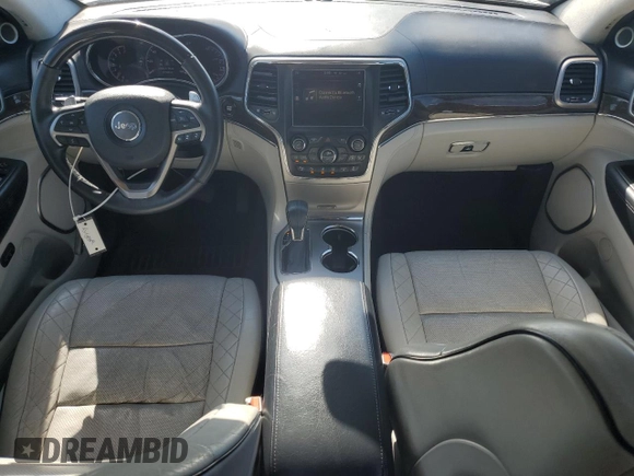 2017 Jeep Grand Cherokee Summit with VIN 1C4RJFJT9HC736624, listed as a Copart auction lot 62197245 with 217,469 mi miles and Salvage title. Bid and sale history available at DreamBid. Image 8.