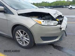 2016 Ford Focus SE with VIN 1FADP3F23GL350387, listed as a IAAI auction lot 41948782 with 70,188 mi miles. Bid and sale history available at carsss.com. Image 12.