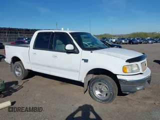 2003 Ford F-150 XLT with VIN 1FTRW08633KD11896, listed as a IAAI auction lot 42137360 with 118,654 mi miles. Bid and sale history available at carsss.com. Image 1.