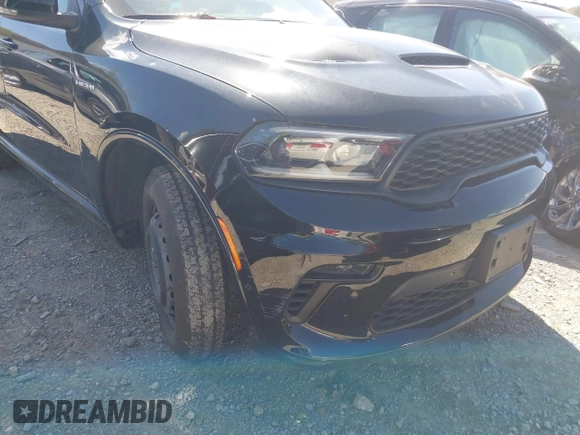 2023 Dodge Durango R/T Plus z VIN 1C4SDHCT7PC553285, wystawiony jako IAAI lot #41875441 z przebiegiem 25 419 mil mil oraz . Historia ofert i sprzedaży dostępna na DreamBid. Obrazek 6.