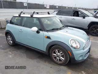 2013 MINI Hardtop with VIN WMWSU3C50DT546031, listed as a IAAI auction lot 42542290 with 119,711 mi miles and . Bid and sale history available at DreamBid. Image 1.