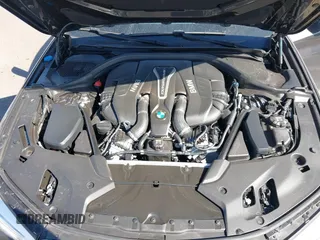 2018 BMW 5 Series M550i xDrive with VIN WBAJB9C51JB049513, listed as a IAAI auction lot 41146990 with 51,218 mi miles. Bid and sale history available at carsss.com. Image 10.