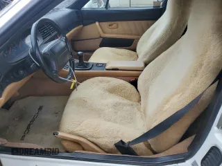 1995 Porsche 968 z VIN WP0CA296XSS840145, wystawiony jako Copart lot #68026874 z przebiegiem 105 017 mil mil oraz Szkody całkowita. Historia ofert i sprzedaży dostępna na DreamBid. Obrazek 7.