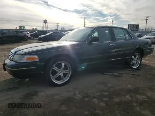 1998 Ford Crown Victoria LX с VIN 2FAFP74W5WX108191, выставлен на аукционе Copart как лот 83532344 с пробегом 125 306 миль миль и Списание • Salvage title. История ставок и продаж доступна на DreamBid. Изображение 1.