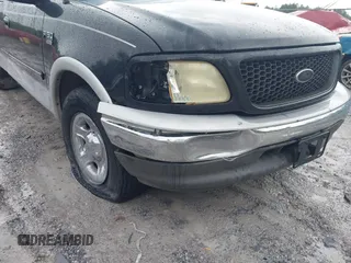 2003 Ford F-150 XL with VIN 1FTRX17L13NA01819, listed as a IAAI auction lot 42719787 with Not provided miles and . Bid and sale history available at DreamBid. Image 6.