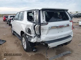 2021 GMC Yukon SLT with VIN 1GKS1BKD1MR489922, listed as a IAAI auction lot 40972652 with 77,791 mi miles. Bid and sale history available at carsss.com. Image 3.
