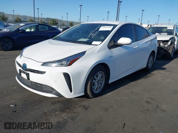 2021 Toyota Prius L Eco with VIN JTDKAMFU0M3149875, listed as a IAAI auction lot 41966010 with 99,542 mi miles. Bid and sale history available at carsss.com. Image 18.