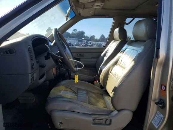 2000 Infiniti QX4 with VIN JNRAR07Y4YW085424, listed as a Copart auction lot 81091324 with 202157 miles and Salvage Title. Bid and sale history available at carsss.com. Image 7.