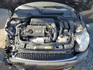 2014 MINI Convertible S with VIN WMWZP3C55ET298172, listed as a Copart auction lot 76977114 with 119,138 mi miles and Salvage title. Bid and sale history available at DreamBid. Image 11.