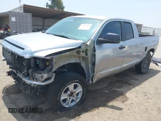 2016 Toyota Tundra SR z VIN 5TFRM5F1XGX099453, wystawiony jako IAAI lot #42492840 z przebiegiem 54 060 mil mil oraz . Historia ofert i sprzedaży dostępna na DreamBid. Obrazek 2.