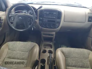 2001 Ford Escape XLS with VIN 1FMYU01181KF33553, listed as a Copart auction lot 52991765 with 214,453 mi miles and Clean Title. Bid and sale history available at carsss.com. Image 8.