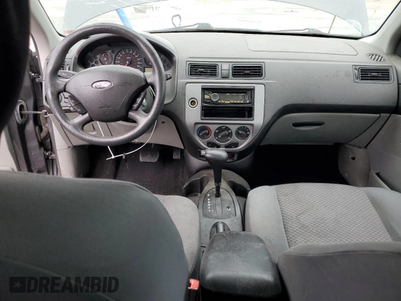 2005 Ford Focus S with VIN 3FAFP37N75R120187, listed as a Copart auction lot 57390605 with 163,547 mi miles and Salvage title. Bid and sale history available at DreamBid. Image 8.