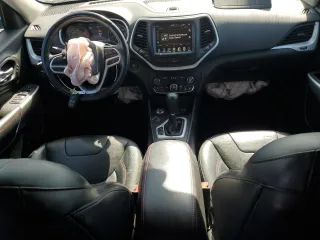 2017 Jeep Cherokee Trailhawk L Plus with VIN 1C4PJMBS4HD237094, listed as a Copart auction lot 61051675 with 104,852 mi miles and Salvage title. Bid and sale history available at DreamBid. Image 8.