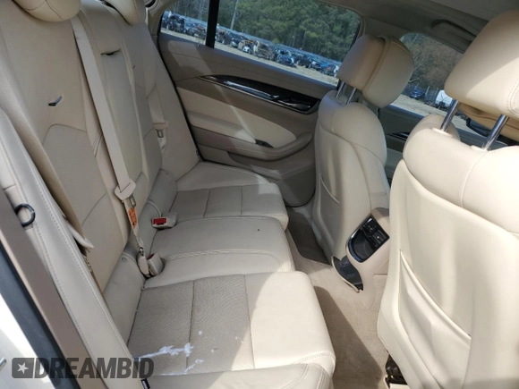 2014 Cadillac CTS Luxury AWD z VIN 1G6AX5SXXE0155317, wystawiony jako Copart lot #53205315 z przebiegiem 83 719 mil mil oraz Szkoda całkowita • Salvage title. Historia ofert i sprzedaży dostępna na DreamBid. Obrazek 10.