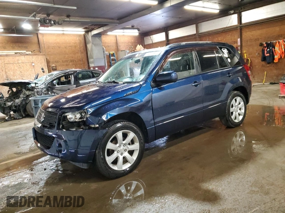 2012 Suzuki Grand Vitara Limited z VIN JS3TD0D77C4101382, wystawiony jako Copart lot #60017895 z przebiegiem 118 024 mil mil oraz Szkoda całkowita • Salvage title. Historia ofert i sprzedaży dostępna na DreamBid. Obrazek 1.