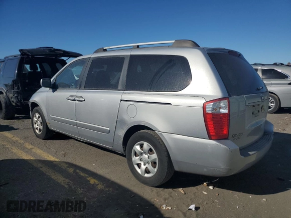2006 Kia Sedona LX with VIN KNDMB233X66049953, listed as a Copart auction lot 76672044 with 126,837 mi miles and Salvage Title. Bid and sale history available at carsss.com. Image 2.