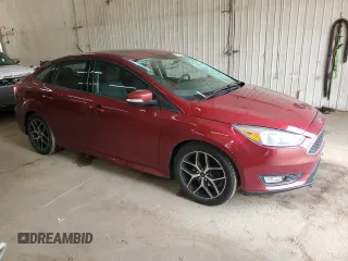 2016 Ford Focus SE with VIN 1FADP3F26GL253961, listed as a Copart auction lot 61583695 with 191,540 mi miles and Salvage title. Bid and sale history available at DreamBid. Image 4.