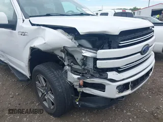 2020 Ford F-150 XL with VIN 1FTFW1E4XLFA55356, listed as a IAAI auction lot 42225427 with 56,865 mi miles and . Bid and sale history available at DreamBid. Image 6.