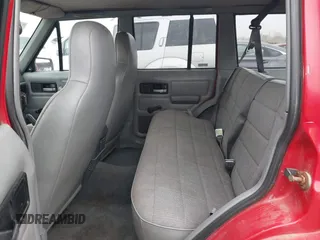 1995 Jeep Cherokee Sport with VIN 1J4FJ68S7SL582142, listed as a IAAI auction lot 41749115 with 185,676 mi miles. Bid and sale history available at carsss.com. Image 8.